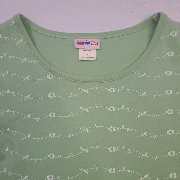light green "American Sweetheart" brand top with a floral pattern. Size L - Picture 3 of 3